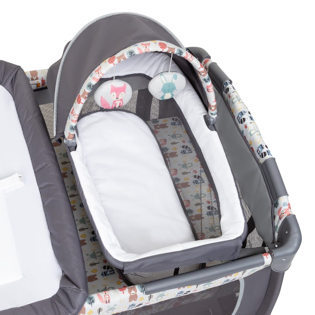 Lil Snooze Deluxe II Nursery Center Playard – Full-Size Bassinet, Changing Table & Tote Bag