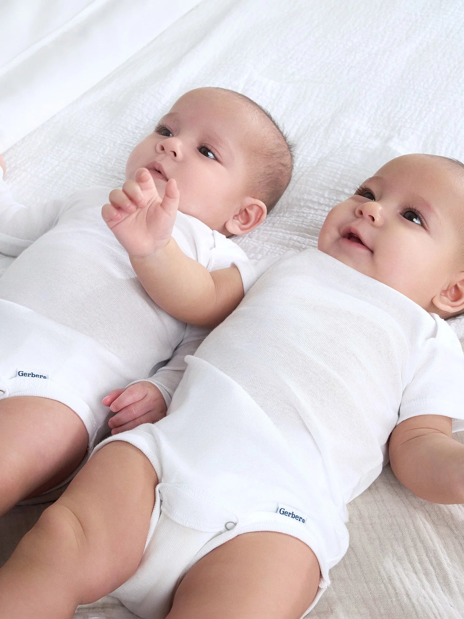 Gerber Gender Neutral Leisure White Long Sleeve Cotton Bodysuit, 3-Pack, Sizes Preemie - 24 Months