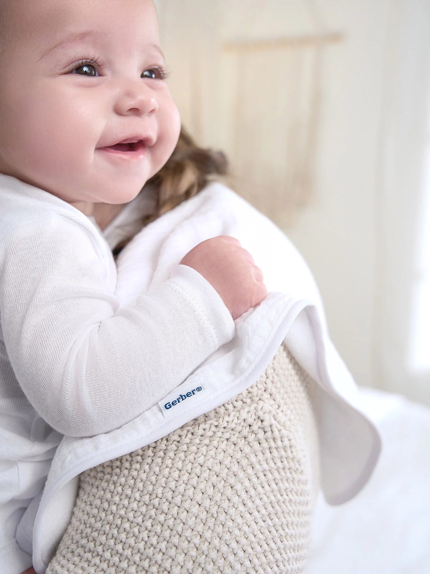 Gerber Gender Neutral Leisure White Long Sleeve Cotton Bodysuit, 3-Pack, Sizes Preemie - 24 Months